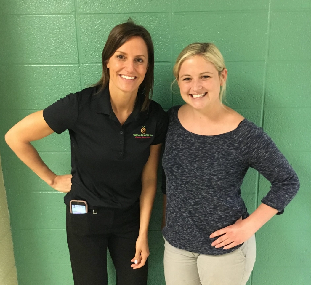 Two Waltham school nutrition staff members involved in the indoor garden program
