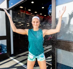 April Liles, founder of April Liles Consulting, celebrating an athletic achievement